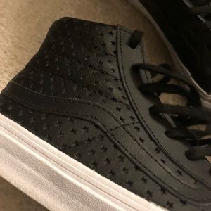 Black leather high top Vans